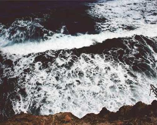 EmbedTAD Using Graph Embedding and Unsupervised Learning to Identify TADs from High-Resolution Hi-C Data